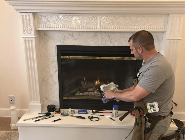 Hialeah Chimney Sweep performing fireplace maintenance in Hialeah, FL